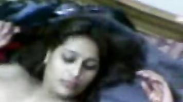 Young Pakistani housewife Nazia from Karachi in red sari stripping naked for sex with her man.