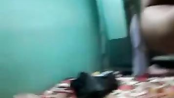 Indian couple playing fetish games in their bedroom.