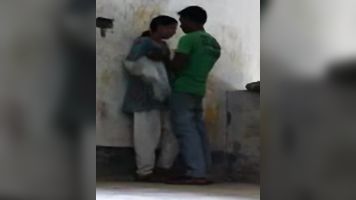 Patna, Bihar high school girl in coaching center roof after class with her boyfriend who passionately kissed her and pressing her juicy boob!.