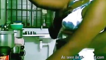 Indian amateur couple fucking in the kitchen.
