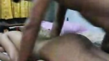 Indian men fucking his wife in one of the exotic missionary position pumping her pussy.